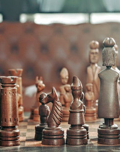 Chess pieces representing Project Financing & Security Arrangements Practice Area